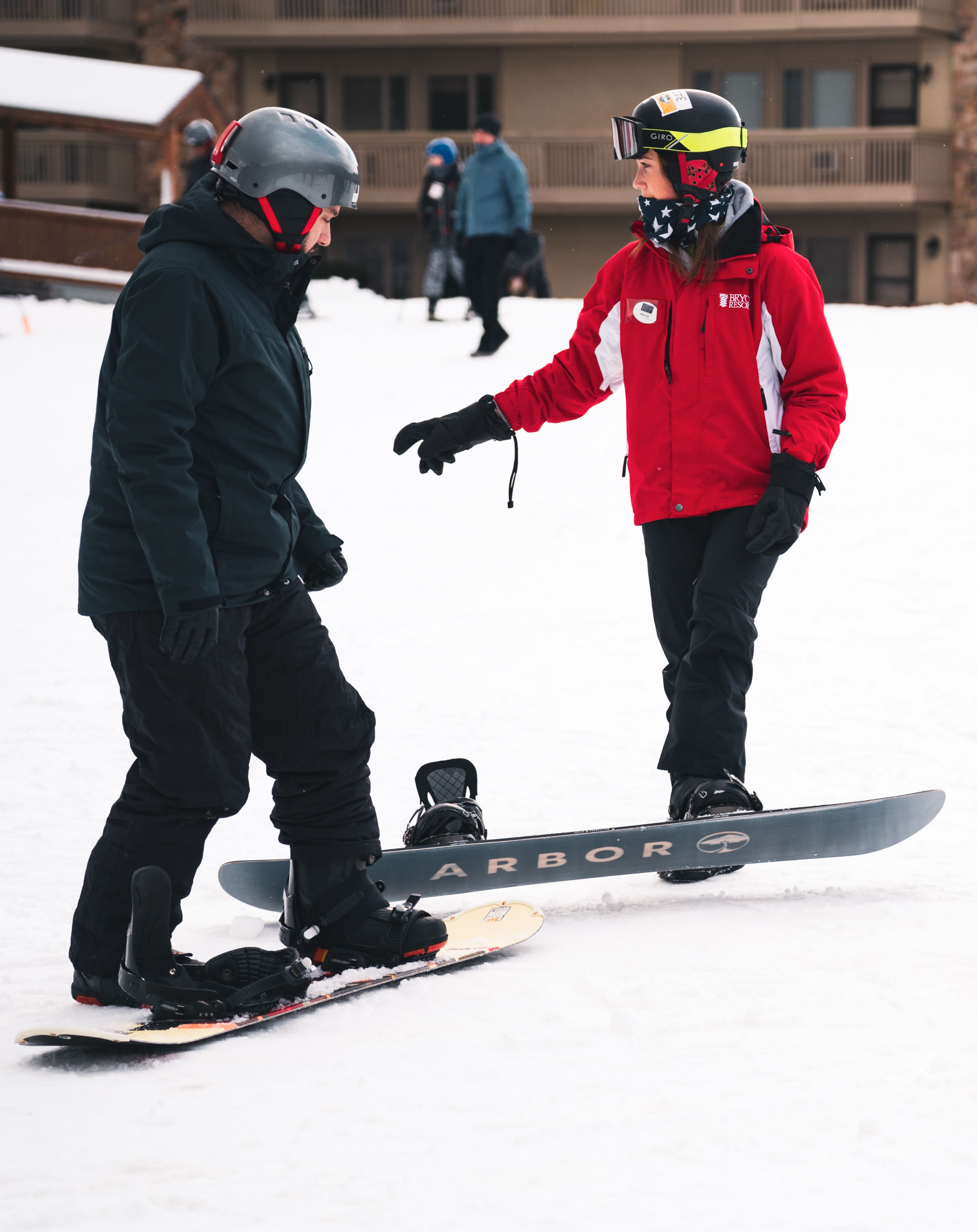 A snowboarder cruising down the picturesque slopes at Bryce Resort in Virginia showcasing a stunning blend of winter beauty and adrenaline-fueled sport.