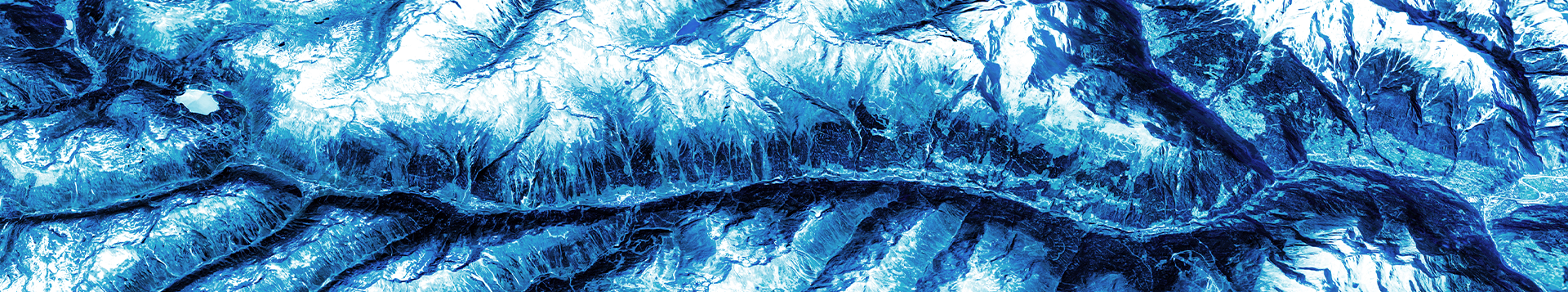 Scenic view of the Galtuer - Silvapark in Tyrol, Austria, with a beautiful mountain peeking through a winter landscape. A cozy chalet can be seen amongst the snow, ideal for winter sports enthusiasts.