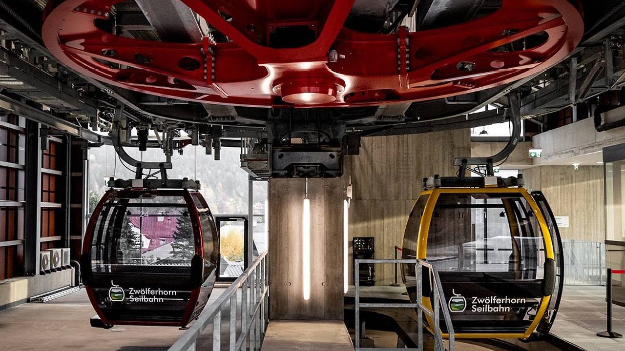 Zwölferhorn-Seilbahn Ges.m.b.H. in Austria: two cable cars in the middle of a building.