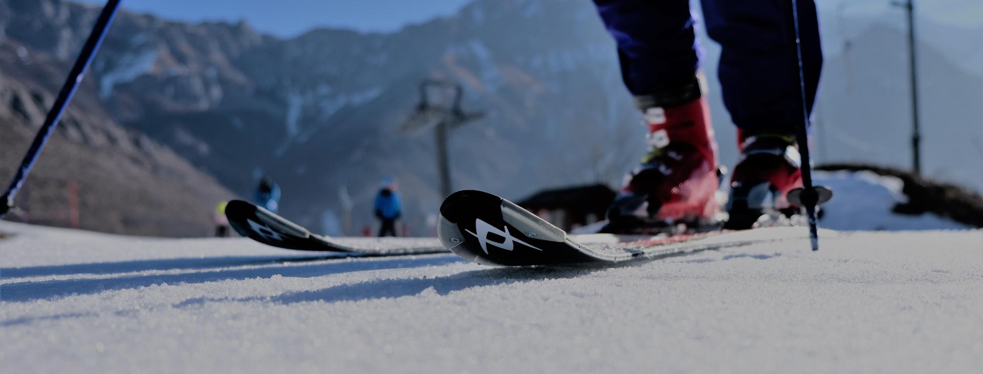 Entracque in Italy - a person skiing down a snowy slope.