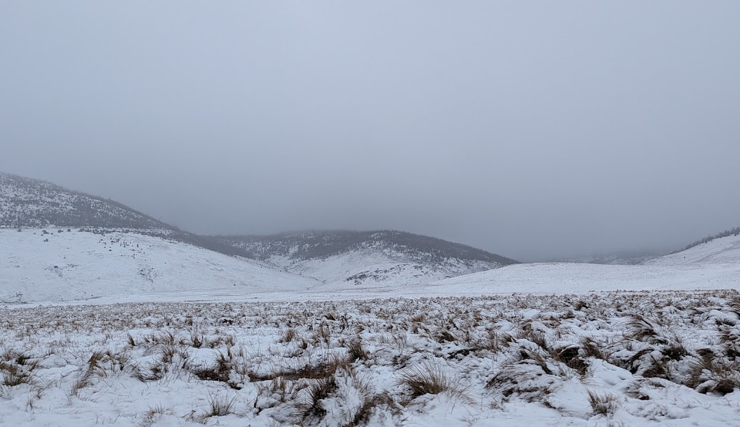 Winter scenery at Selwyn Snowfields in Kiandra, New South Wales, featuring a breathtaking view of snowy mountains, indicative of winter sports activities.