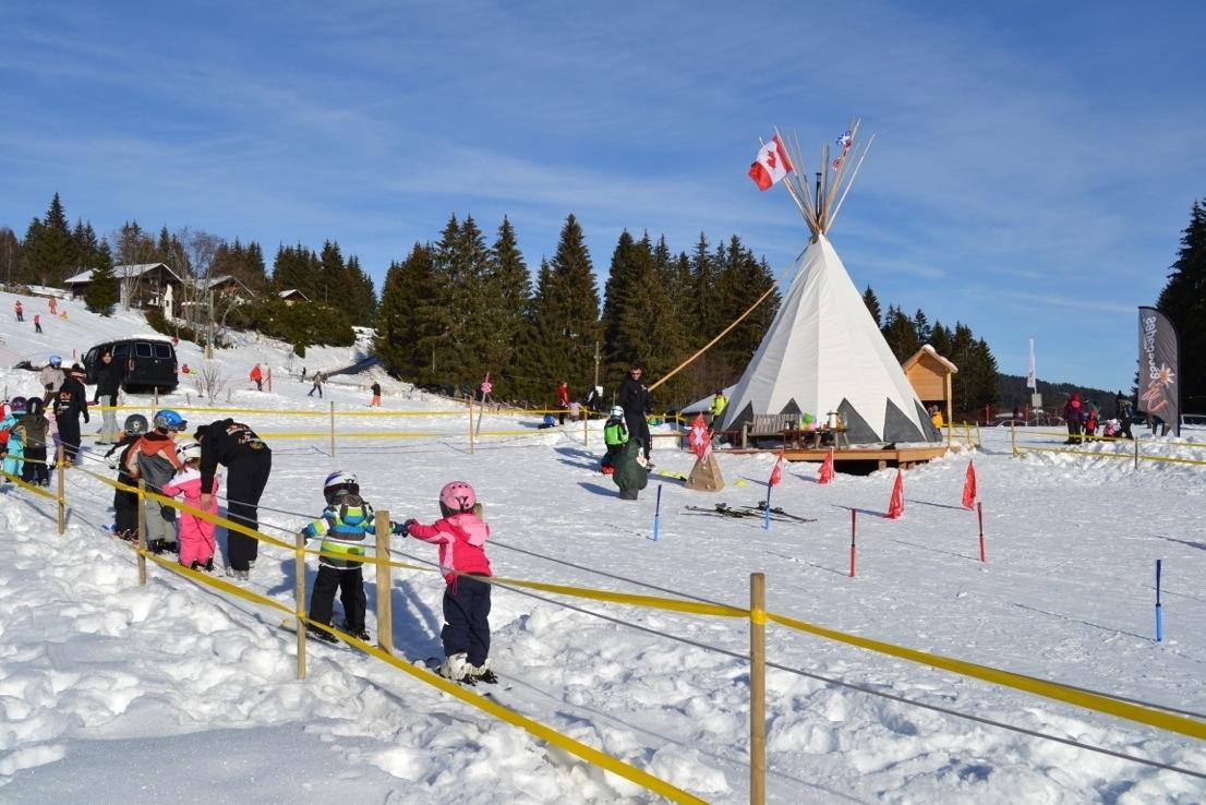 Les Paccots | Châtel-St-Denis – Corbetta in Switzerland - a group of children playing in the snow.