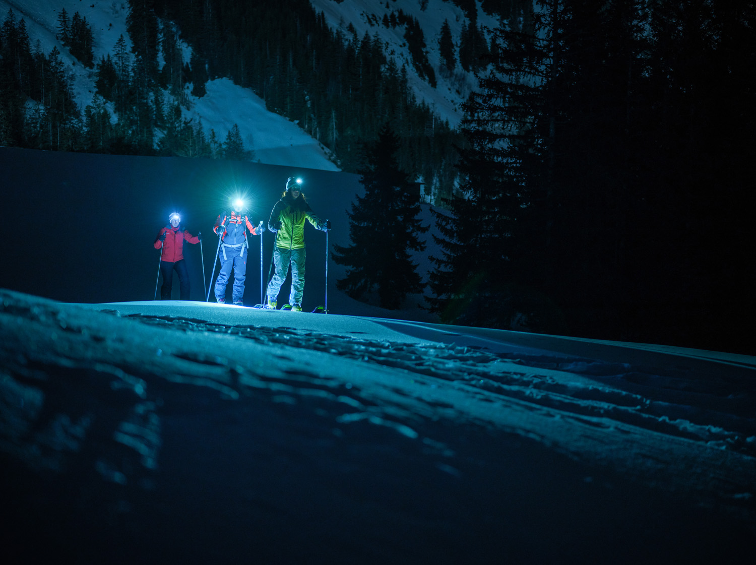 Les Paccots | Châtel-St-Denis – Corbetta in Switzerland - a group of people standing on top of a snow covered slope.