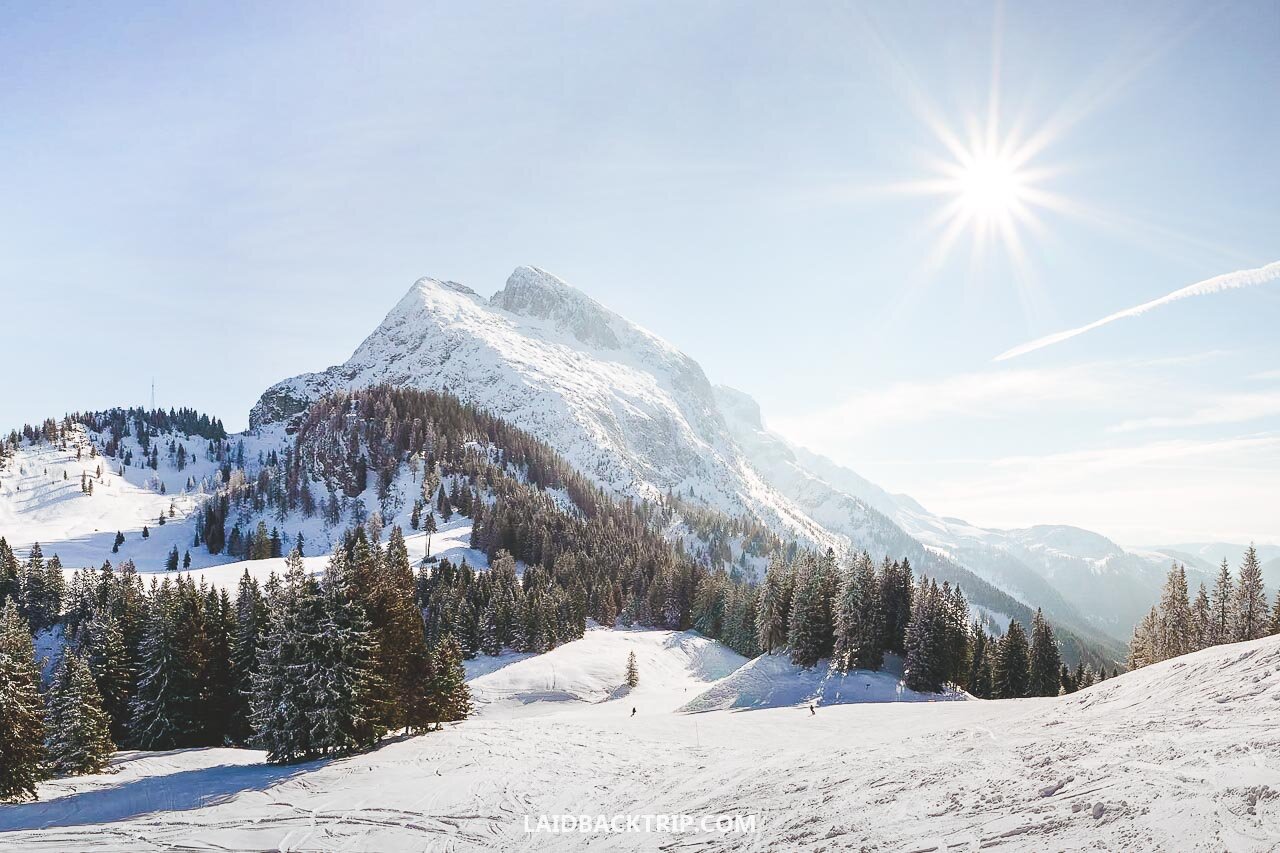Dachstein West – Gosau | ​Russbach | ​Annaberg in Austria - the sun is shining in the sky.
