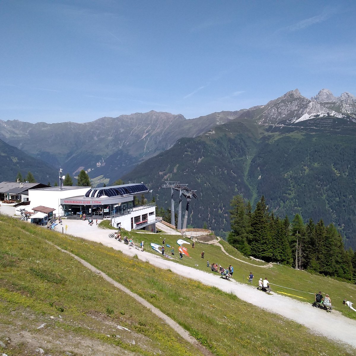 Elfer – Neustift in Austria - a group of people riding bikes down a hill.