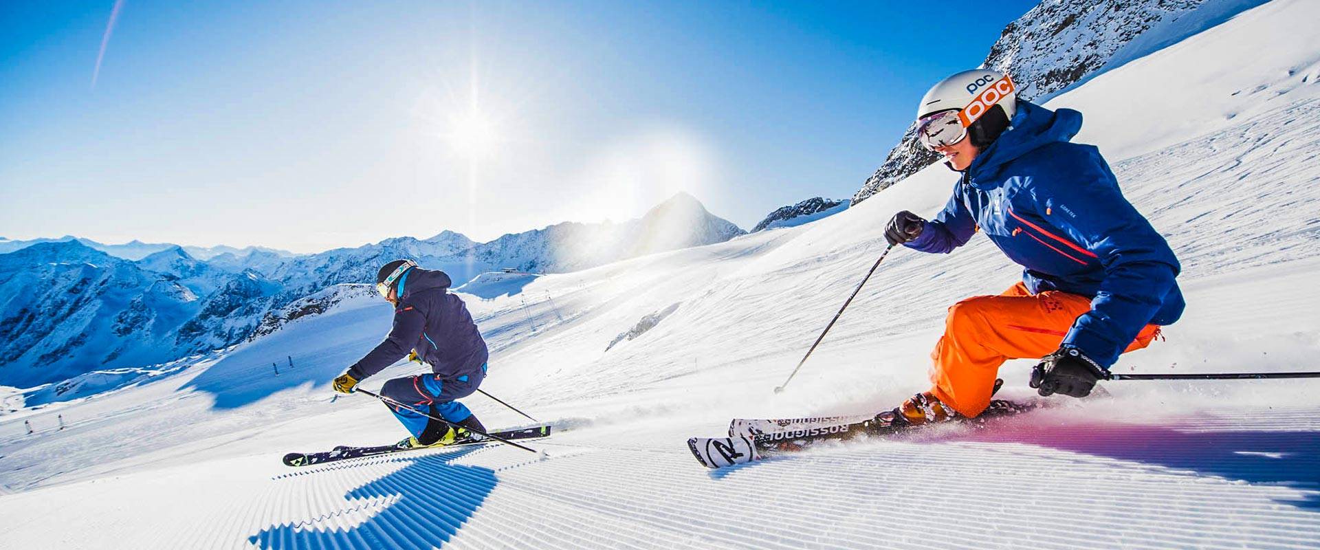 Elfer – Neustift in Austria - two people skiing down the side of a mountain.