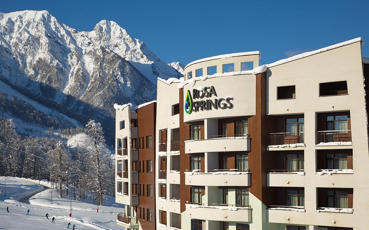 Krasnoye Ozero in Russia: a ski resort with snow covered mountains in the background.