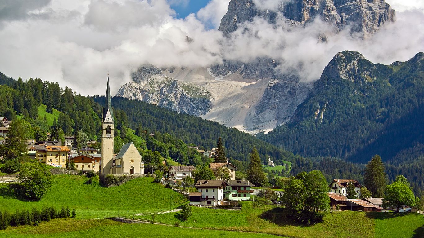 Civetta – Alleghe | Selva di Cadore | Palafavera | Zoldo in Italy - the mountains are covered in clouds.