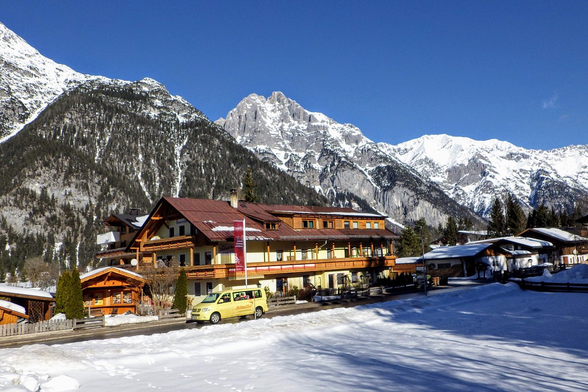 Katzenkopf Leutasch in Austria - a small town in the mountains covered in snow.