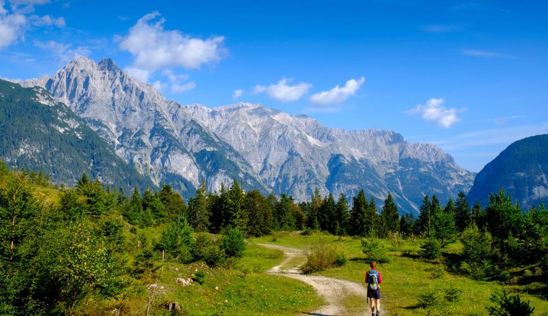 Katzenkopf Leutasch in Austria - a person walking on a trail in the mountains.
