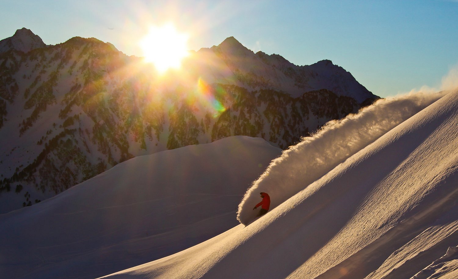 Pont d'Espagne in France - a person skiing down a snow covered mountain.