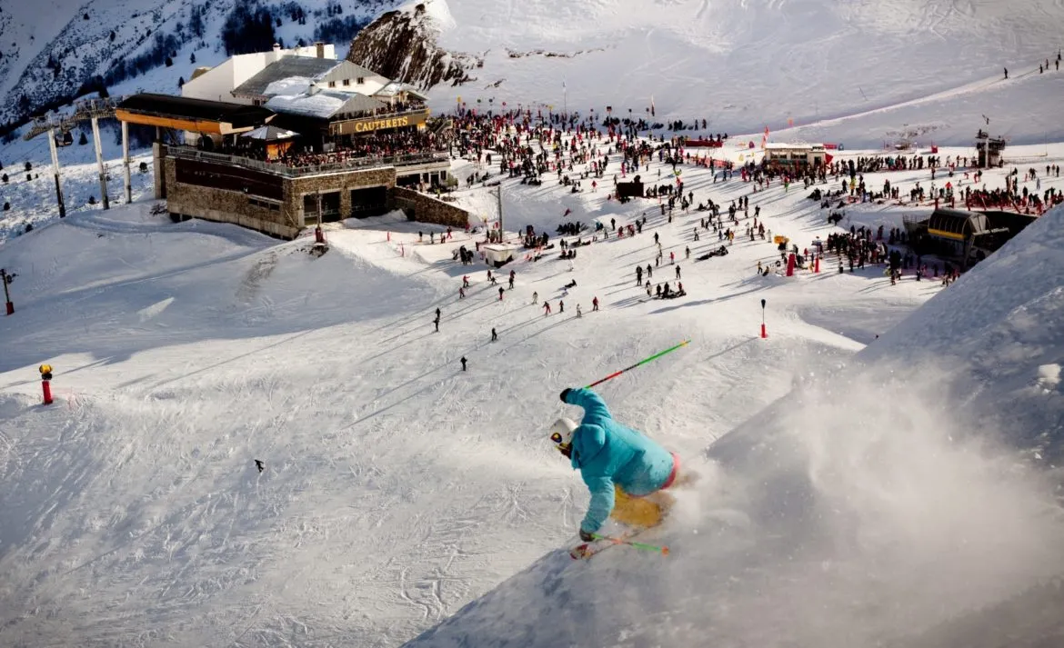 Pont d'Espagne in France - a person on a snowboard going down a hill.