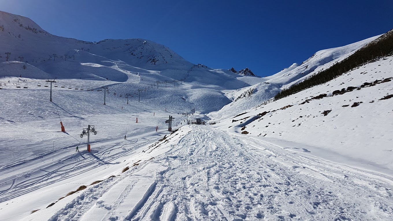 Peyragudes in France - a snow covered mountain with a ski lift in the background.