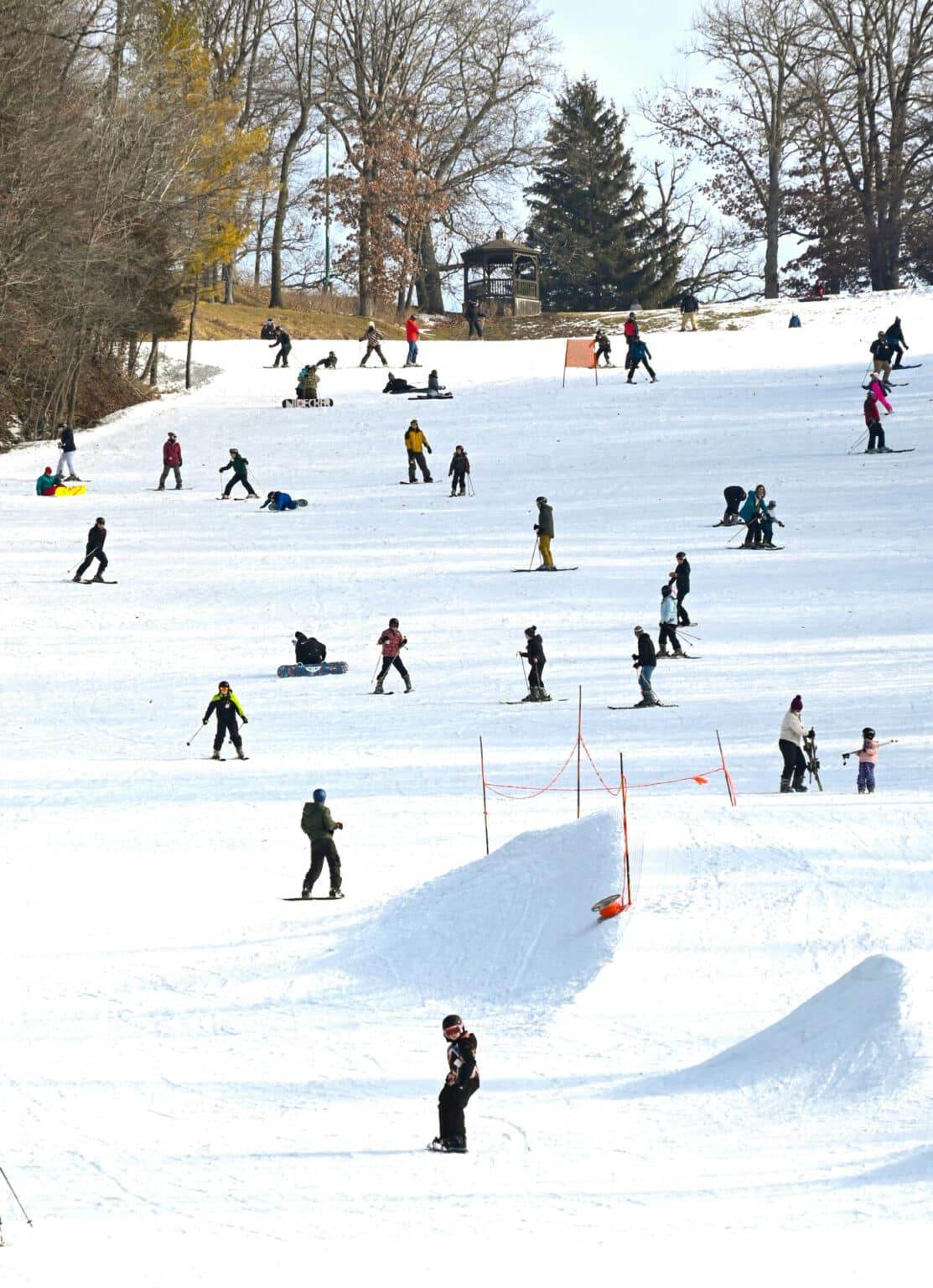 Chestnut Mountain in USA - a group of people skiing down a hill.