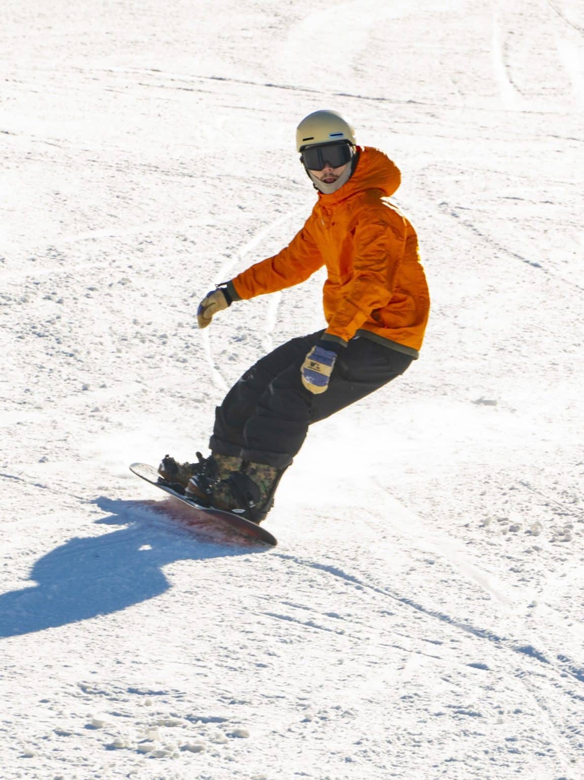 Chestnut Mountain in USA - a person on a snowboard in the snow.