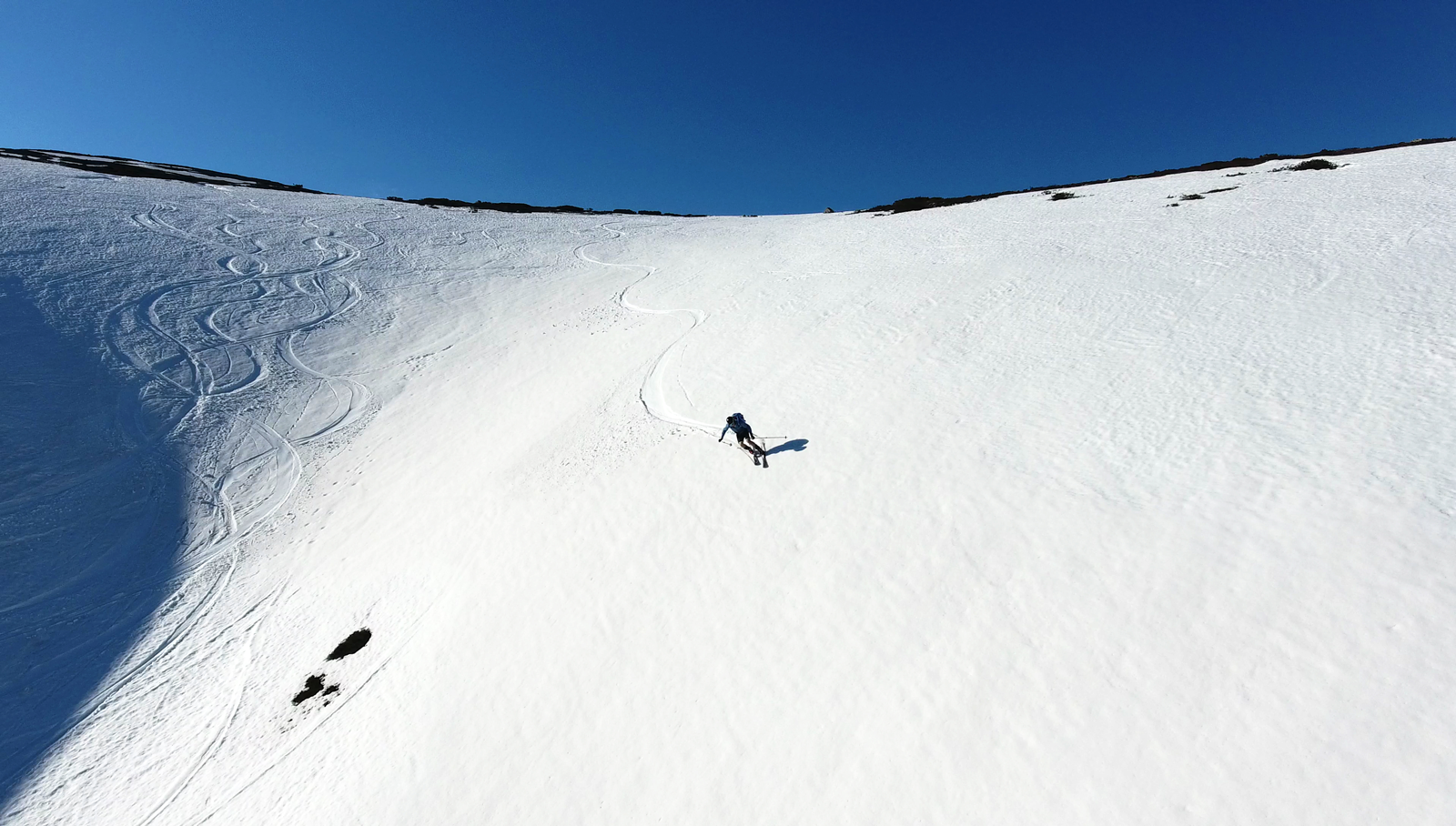 Pallas in Finland - a person skiing down a snow covered mountain.