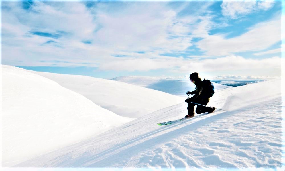 Pallas in Finland - a person skiing down a snow covered mountain.