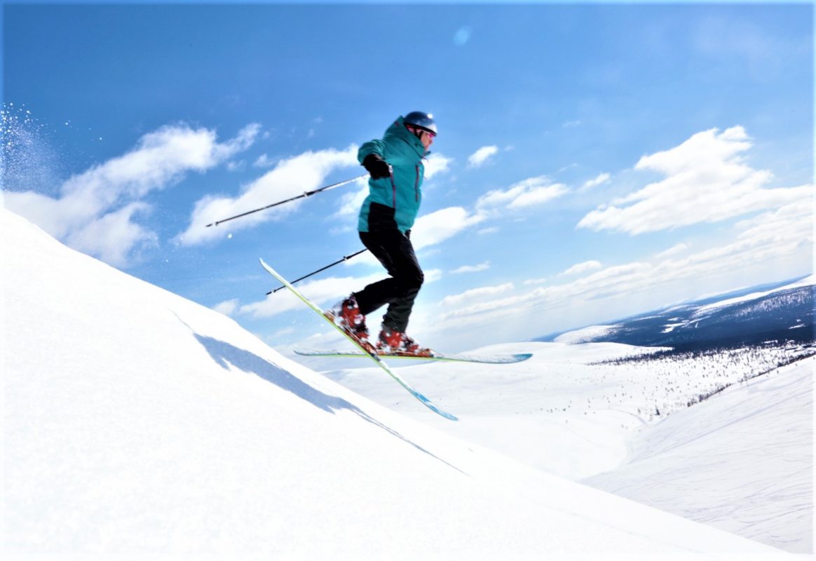 Pallas in Finland - a person jumping in the air on skis.