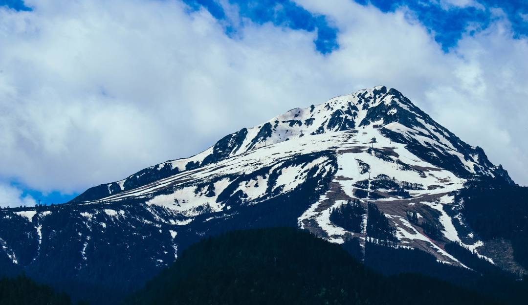 Mountain High North in USA - a mountain with snow on the top.