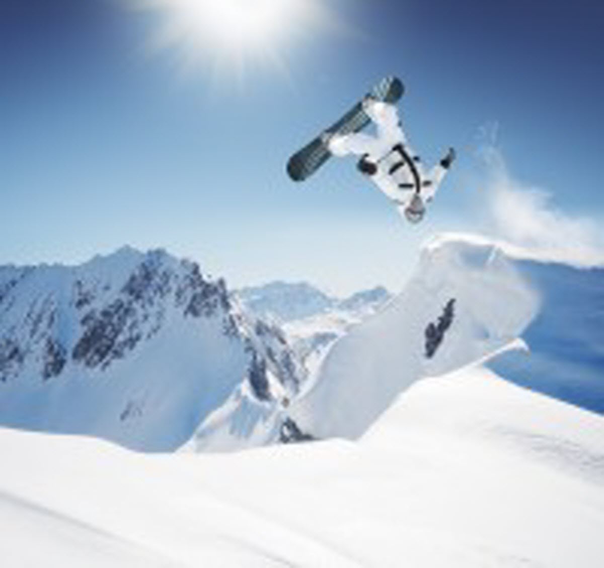 Mountain High North in USA - a snowboarder doing a trick in the air.