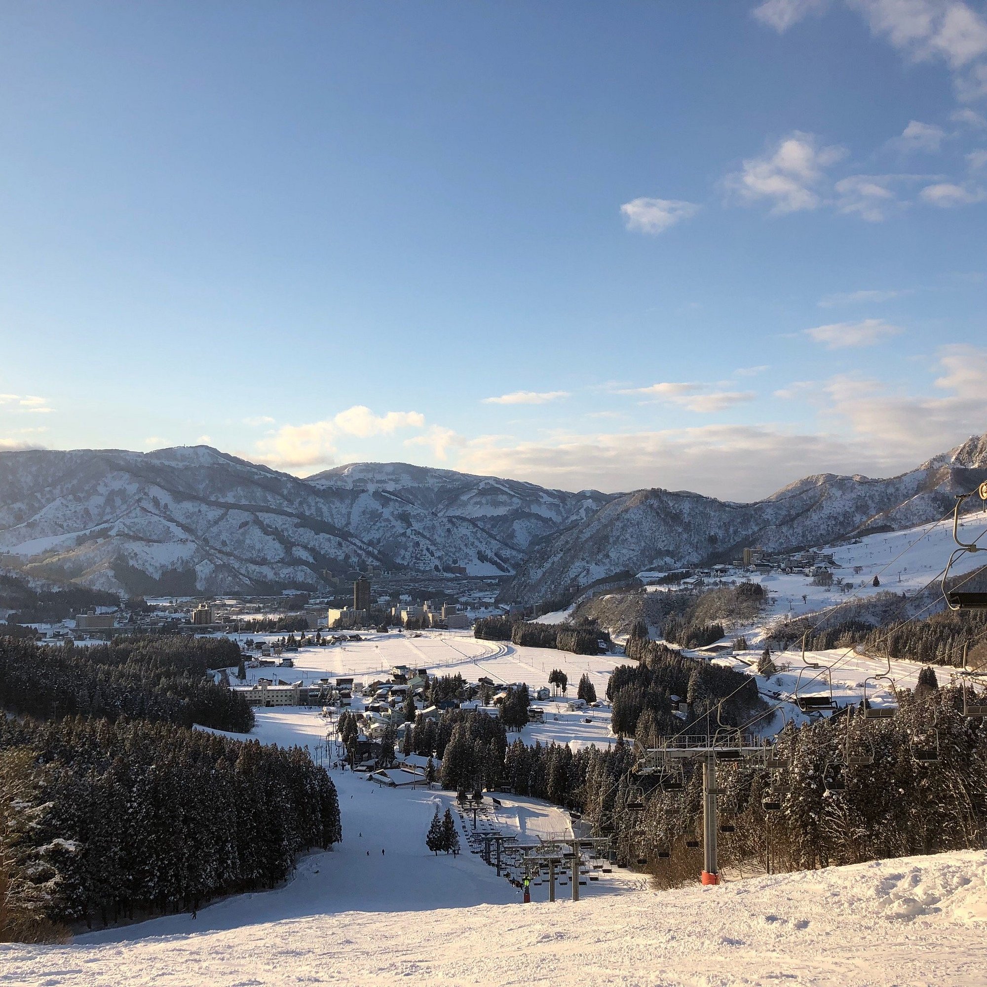 Yuzawa Park in Japan: a view of a ski resort in the mountains.