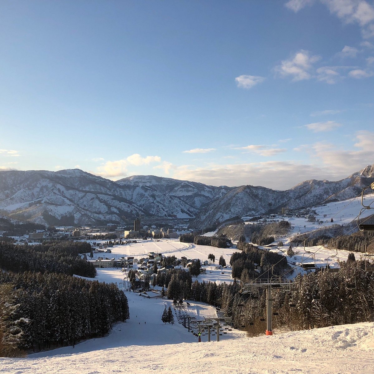 Yuzawa Park in Japan: a view of a ski resort in the mountains.
