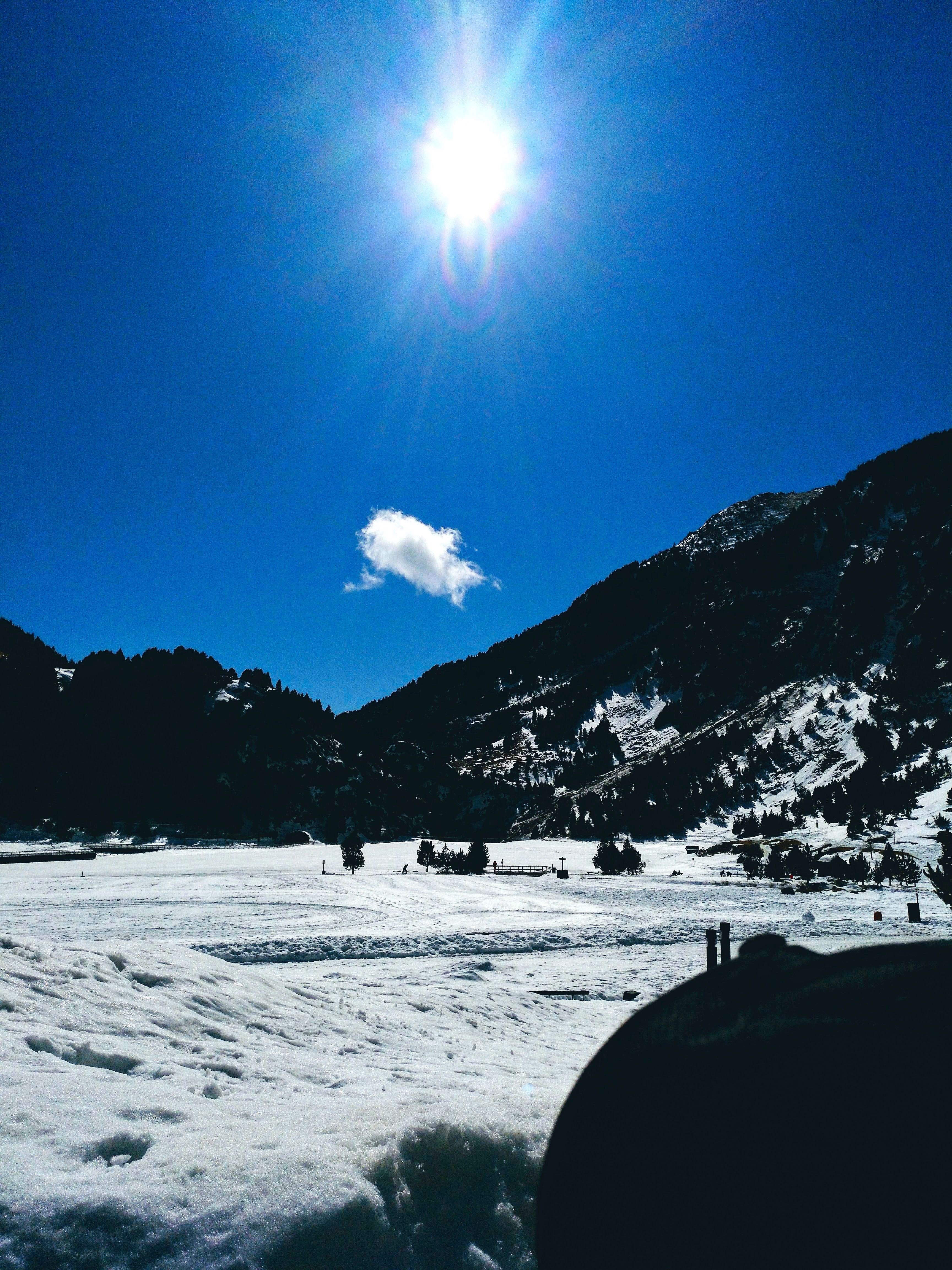 Vall de Núria in Spain - the sun is shining in the blue sky.
