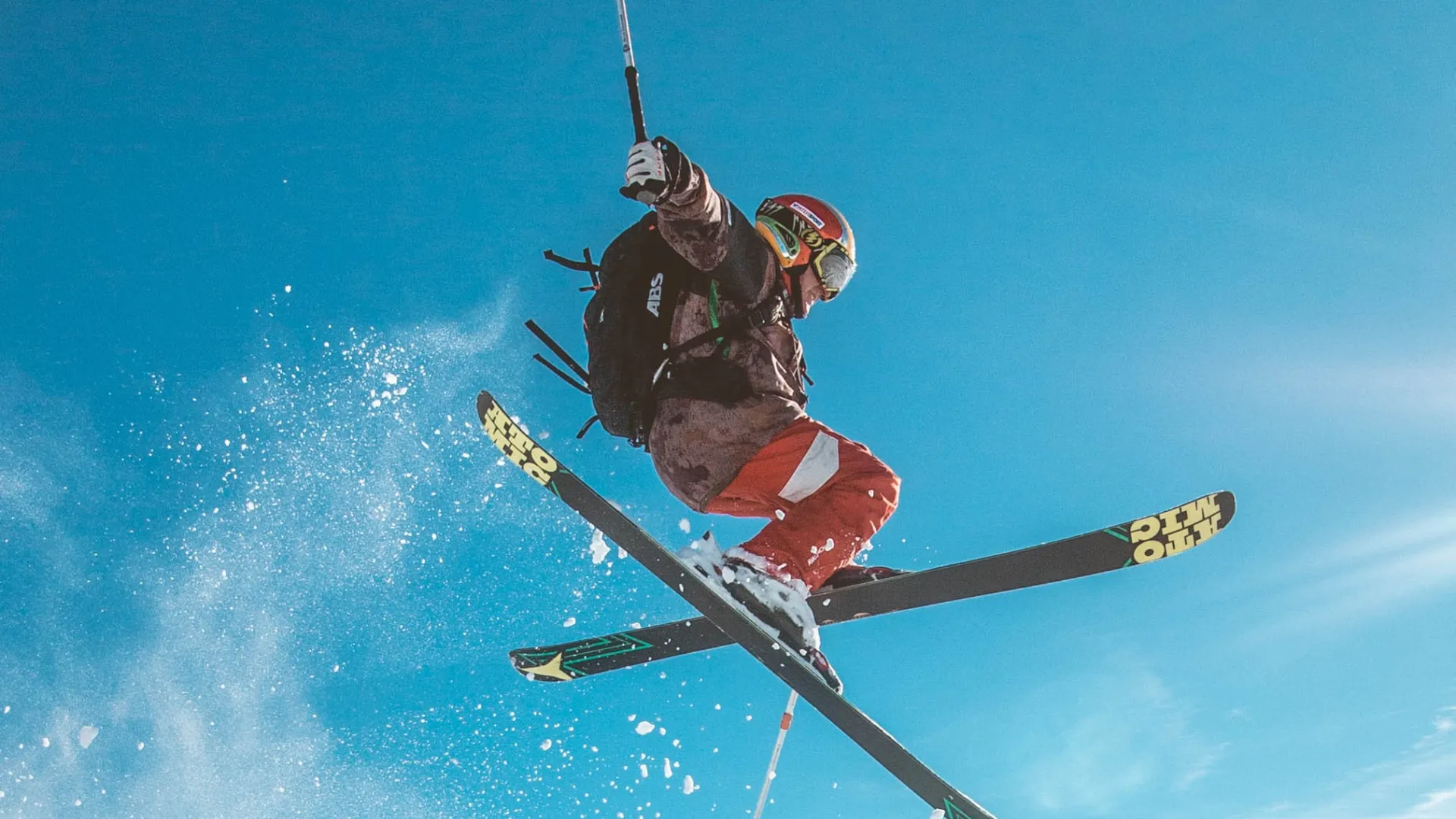 Stryn Vinterski in Norway - a man flying through the air while riding skis.