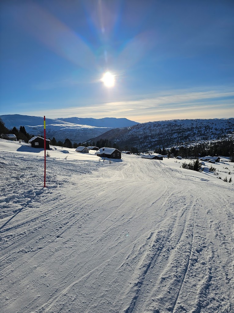Stryn Vinterski in Norway - the sun is shining over the snow covered slopes.