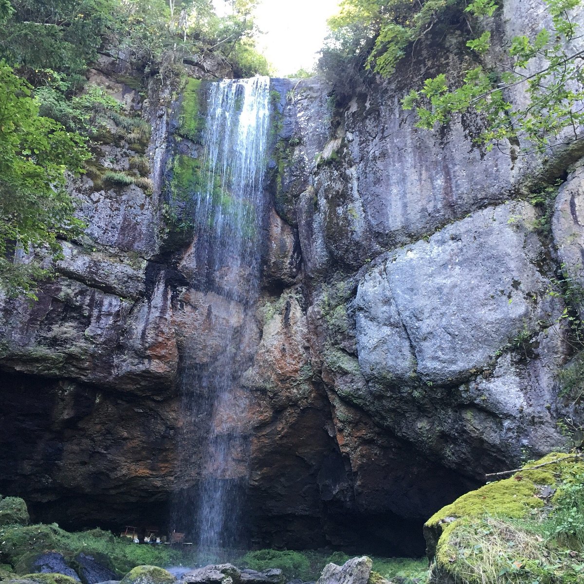 Engaru Rock Valley in Japan - a waterfall in the middle of a forest.