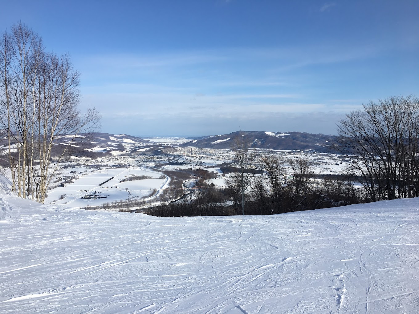 Engaru Rock Valley in Japan - a view from the top of a snowy hill.