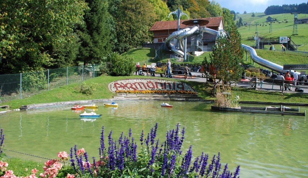 Atzmännig in Switzerland - a small pond in the middle of a village.