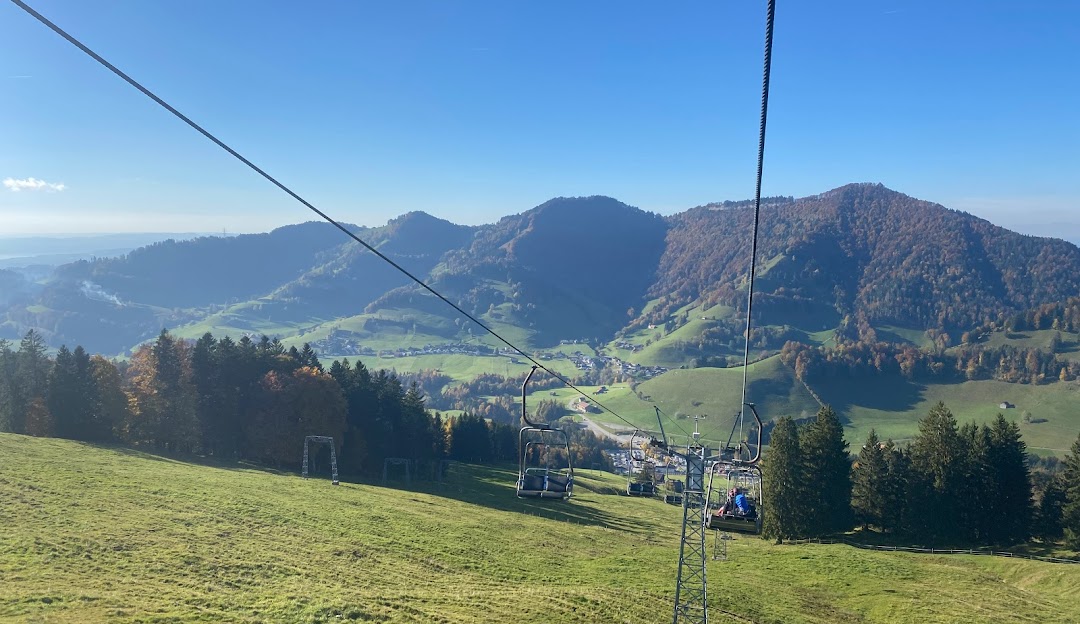Atzmännig in Switzerland - a view from the top of a ski lift in the mountains.