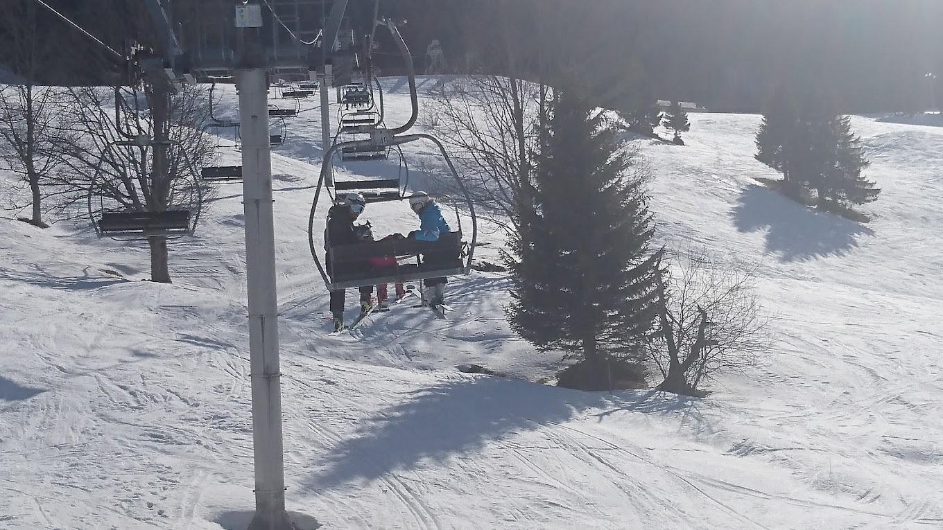 Le Noirmont in France - a ski lift going down a snowy slope.