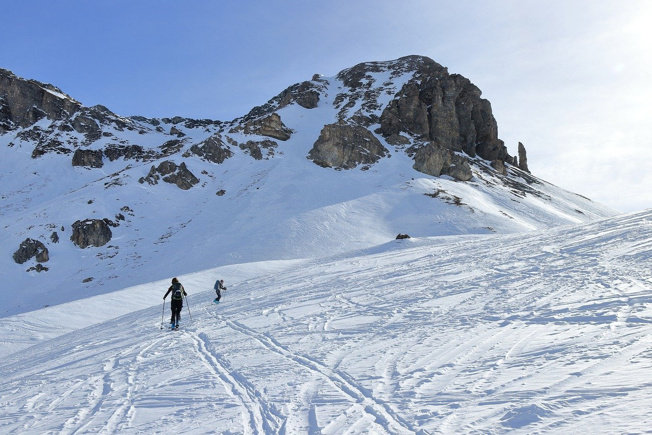 Hohenbogenbahn in Germany - a person skiing down a snow covered mountain.