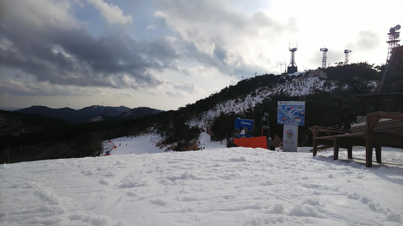 Mineyama Kogen in Japan - a view of a ski slope with snow on it.