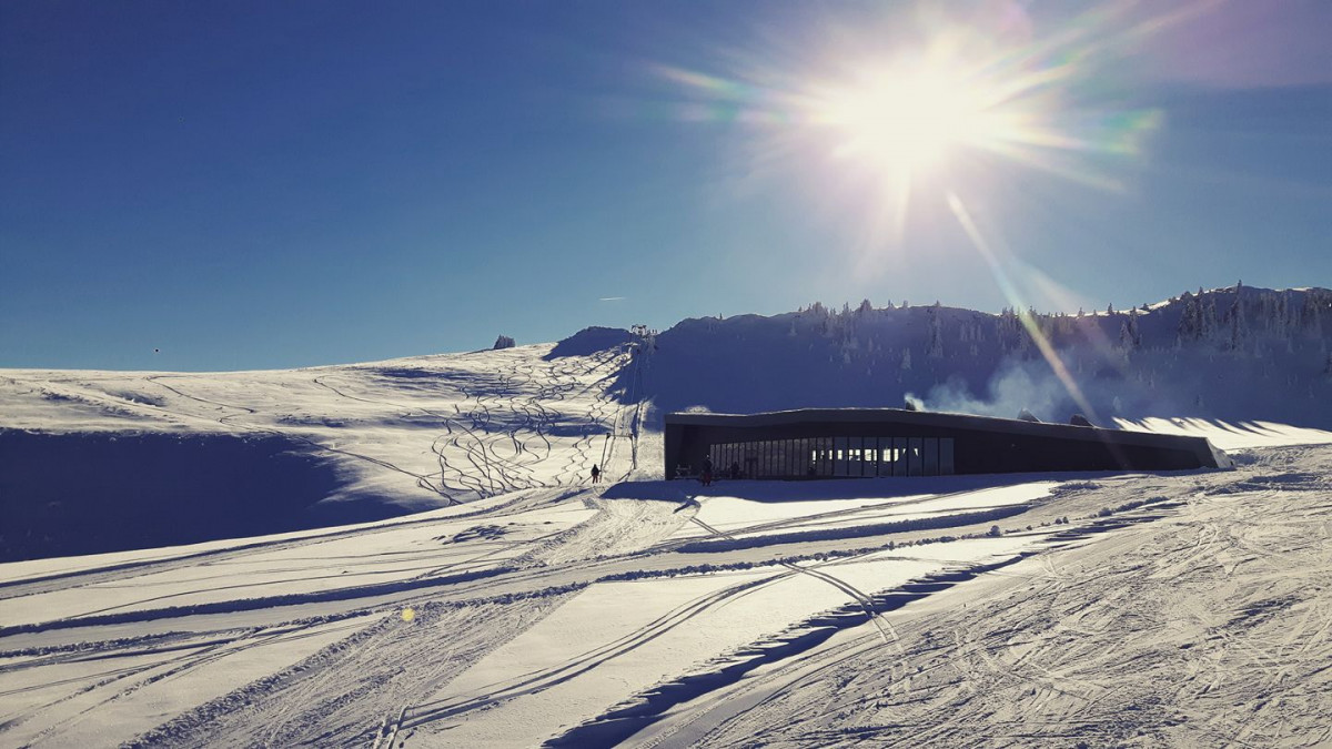 Radusa in Bosnia and Herzegovina - the sun is shining over the snow covered mountains.