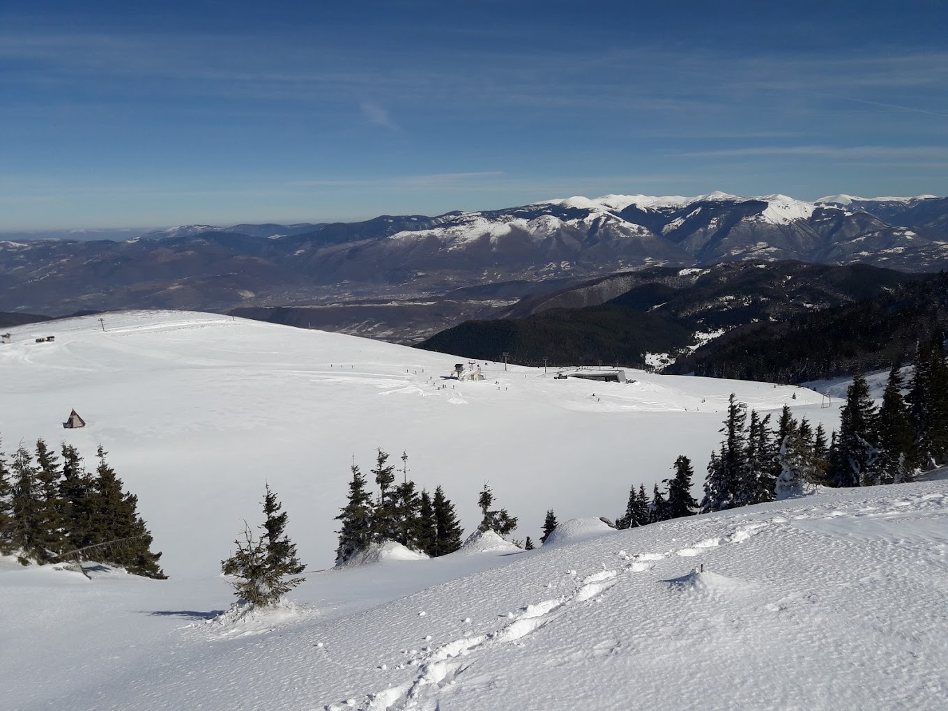 Radusa in Bosnia and Herzegovina - a view from the top of a snowy mountain.