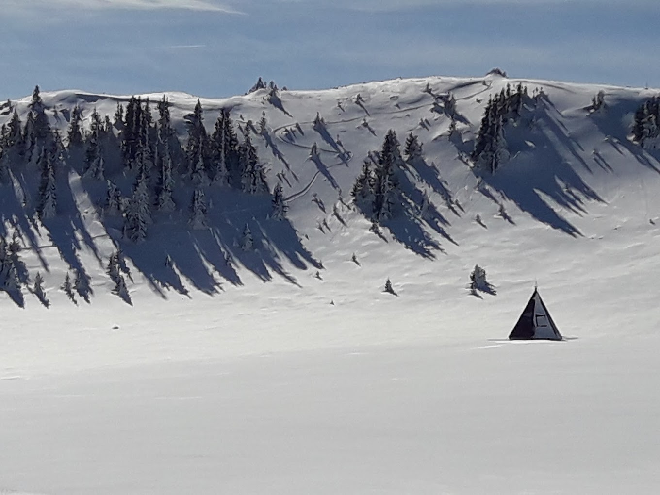 Radusa in Bosnia and Herzegovina - a person skiing down a snow covered mountain.