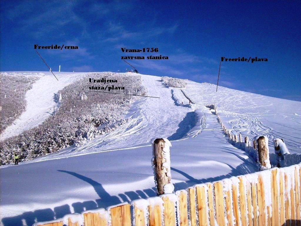 Radusa in Bosnia and Herzegovina - a wooden fence in the snow.