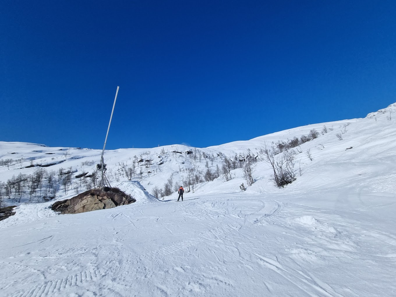 Eikedalen in Norway - a person on skis going down a hill.