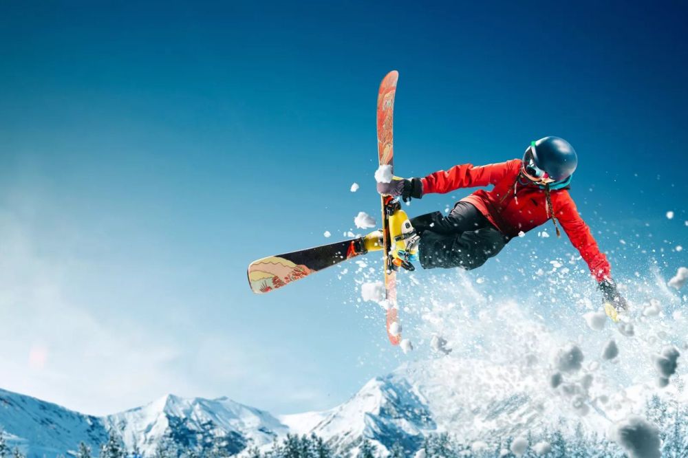 Schwabenbergarena Turnauer Schilift in Austria - a snowboarder doing a trick in the air.