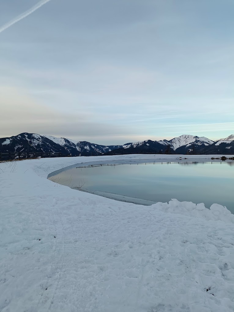 Schwabenbergarena Turnauer Schilift in Austria - a large body of water surrounded by snow.