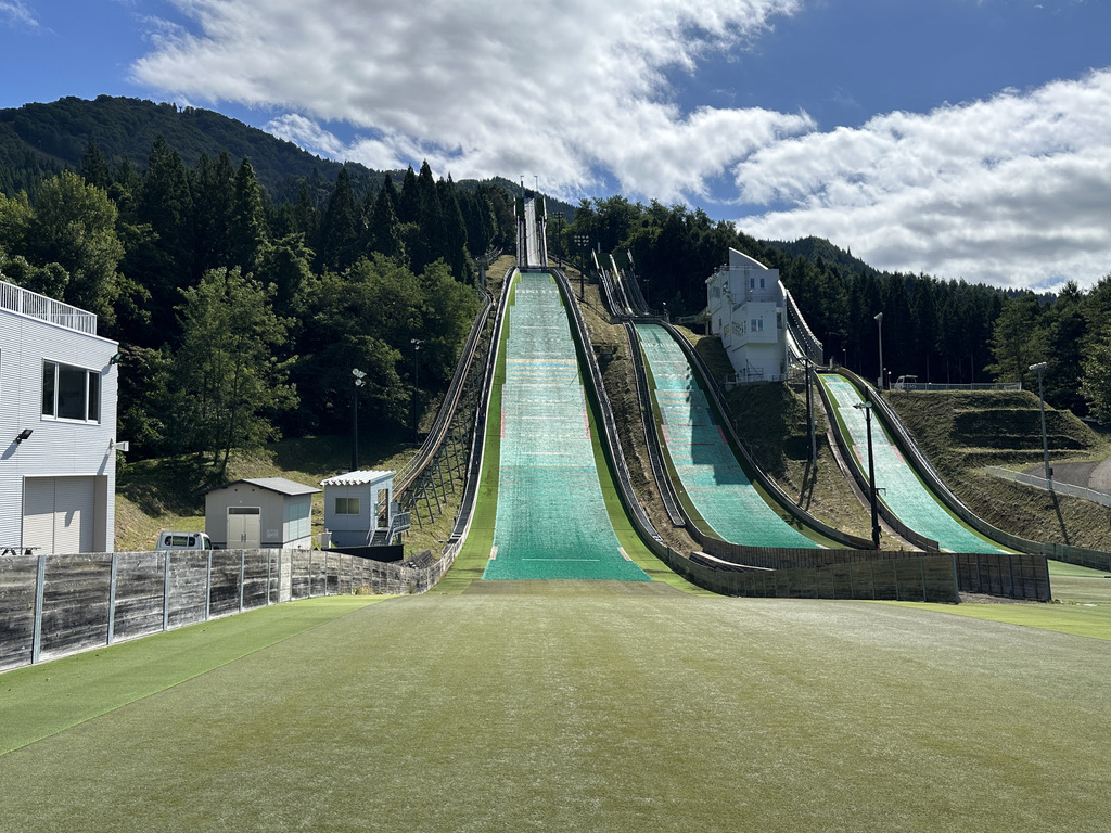 Hanawa in Japan - a large green hill.