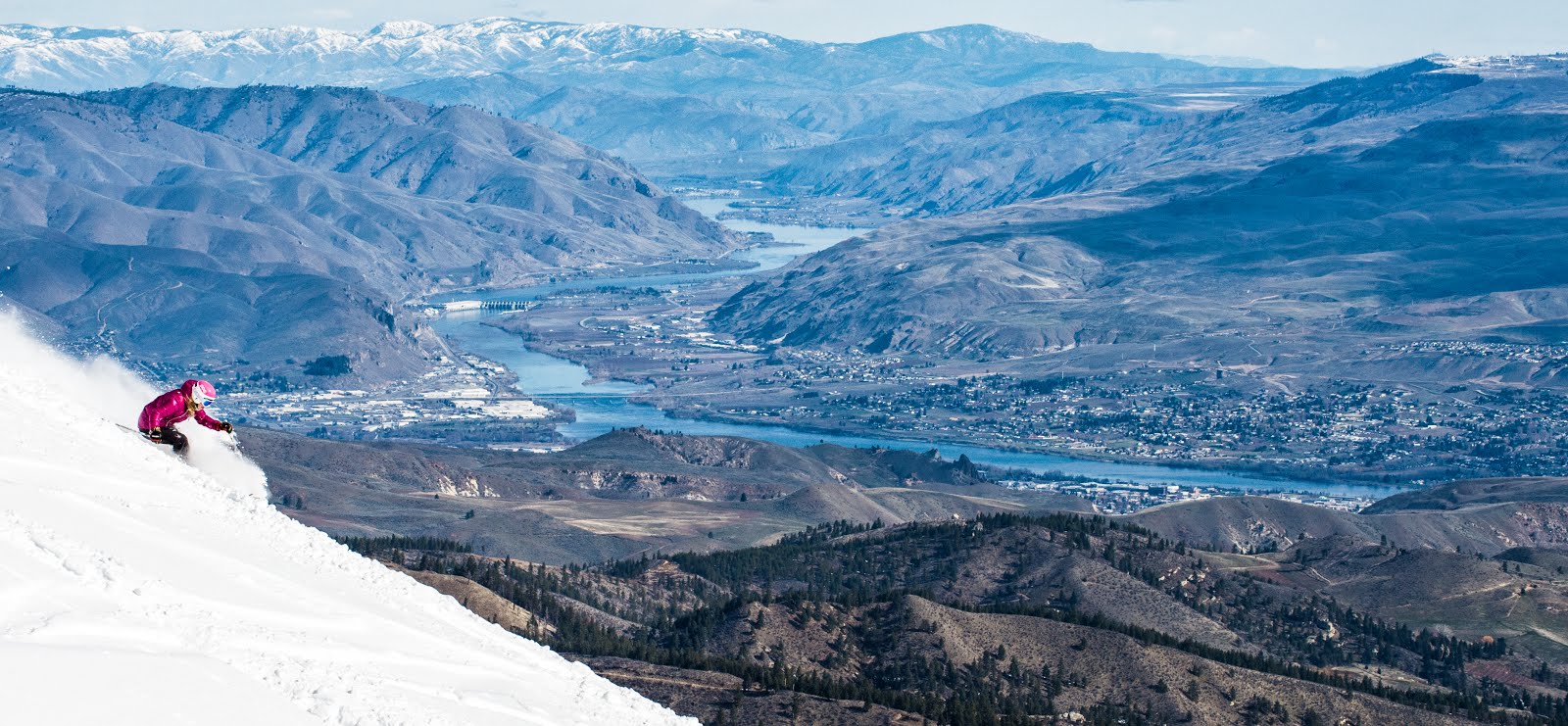 Mission Ridge in Canada - a person skiing down the side of a mountain.