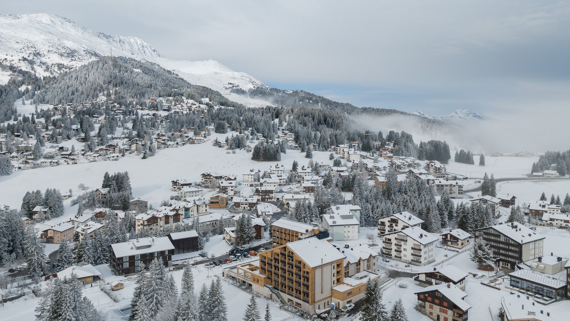 Sciovie Baita Valbella in Italy - a snowy village in the alps of switzerland.