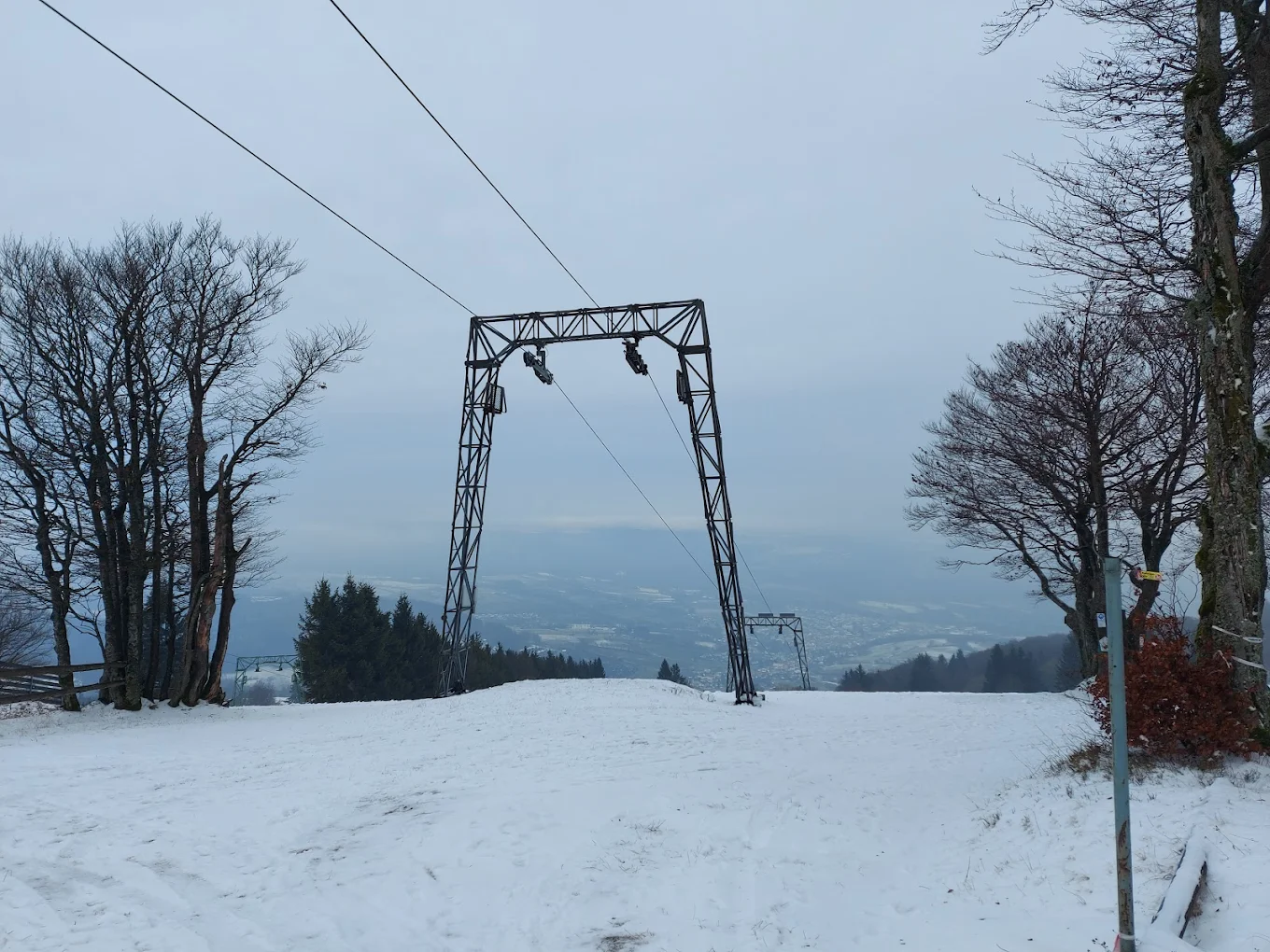 Skilifte Kreuzberg in Germany - a ski lift going up a snowy hill.
