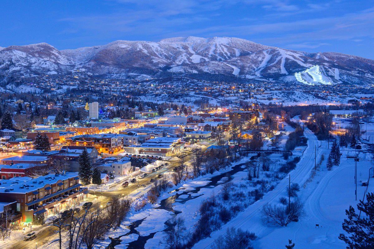 Steamboat in USA - a view of a city with mountains in the background.
