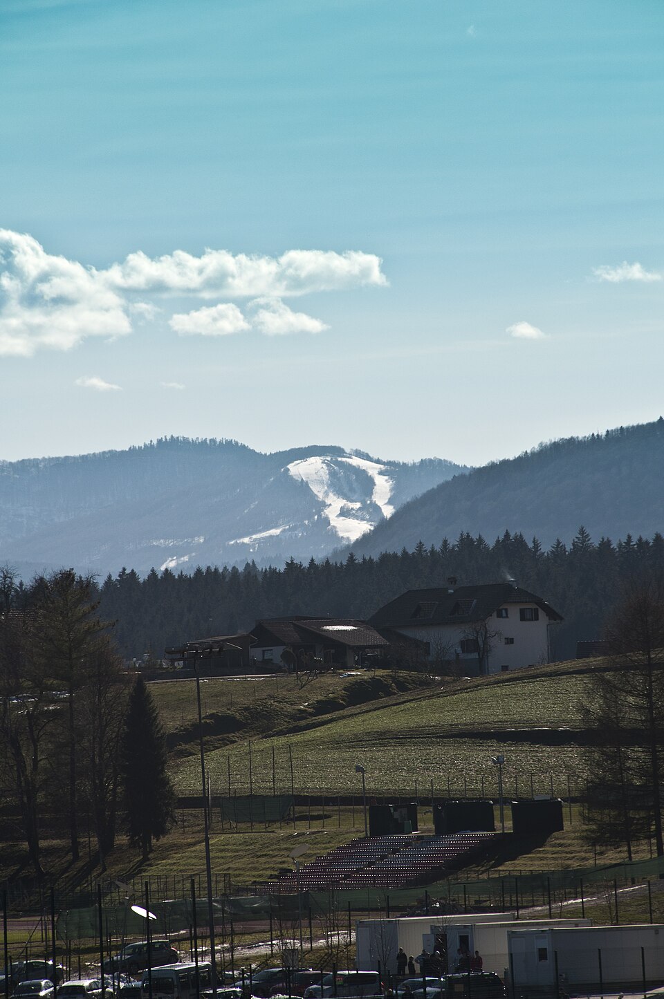 Gače in Slovenia - a view of a small town with mountains in the background.