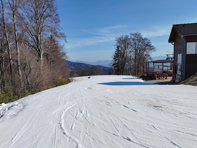 Valčianska Valley in Slovakia - a ski slope with a house in the background.
